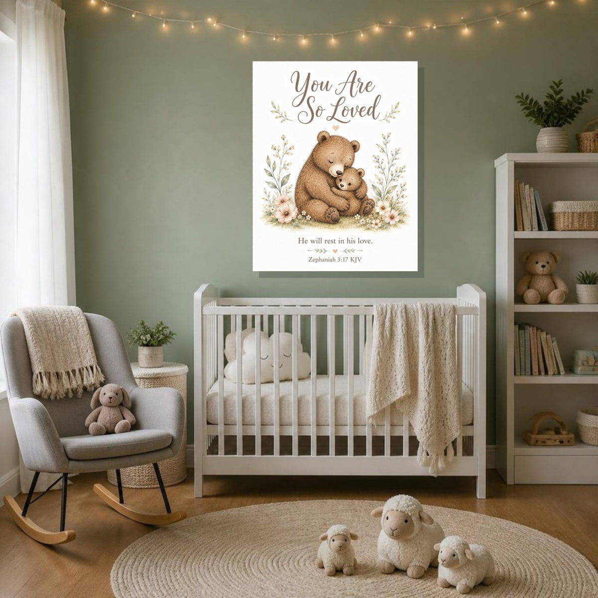You Are So Loved bear canvas print, Zephaniah 3:17 KJV, above a white crib in a sage green nursery