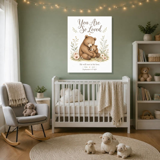You Are So Loved bear canvas print, Zephaniah 3:17 KJV, above a white crib in a sage green nursery